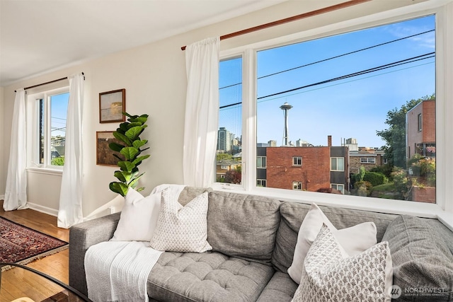 228 Aloha St Unit 403, Seattle, WA 98109 - living room with wood finished floors and baseboards