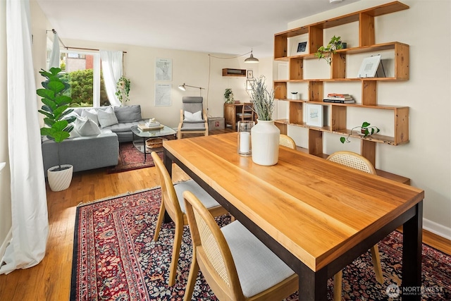 228 Aloha St Unit 403, Seattle, WA 98109 - dining space with wood finished floors
