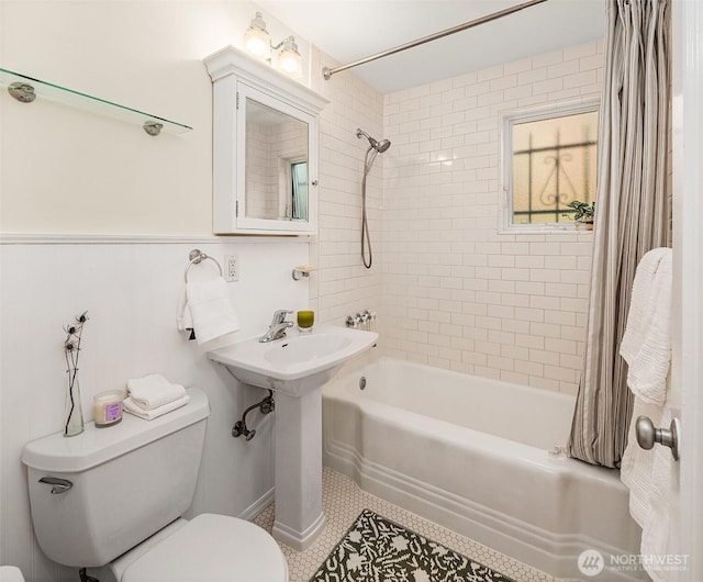 228 Aloha St Unit 403, Seattle, WA 98109 - bathroom with toilet and shower / bathtub combination with curtain