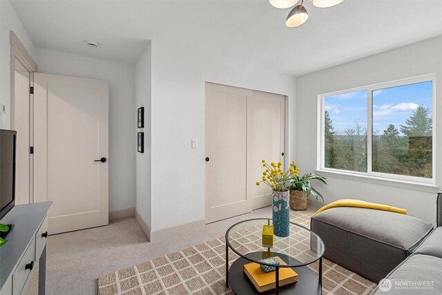 1261 NE 100th St, Seattle, WA 98125 - living room with baseboards and carpet floors