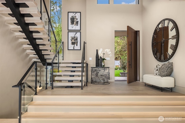 9630 SE 5th St, Bellevue, WA 98004 - staircase with wood finished floors