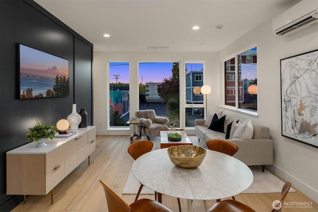 3608 Francis Ave N, Seattle, WA 98103 - living room with a wall mounted air conditioner, light wood-style floors, and recessed lighting