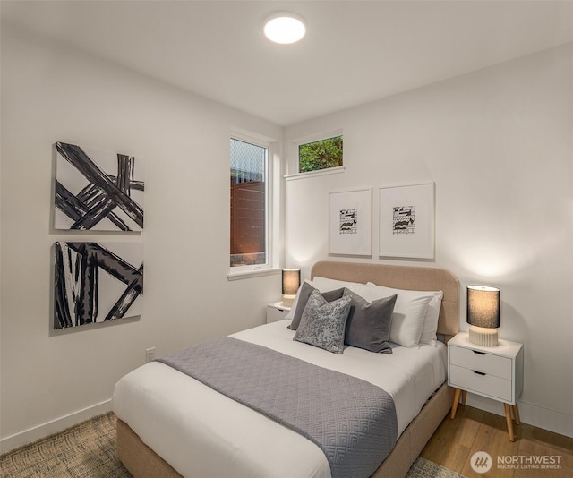 3608 Francis Ave N, Seattle, WA 98103 - bedroom with baseboards and wood finished floors