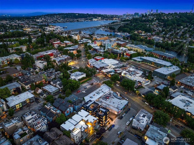 3608 Francis Ave N, Seattle, WA 98103 - aerial view at dusk of a notable bridge, a water view, and a view of city