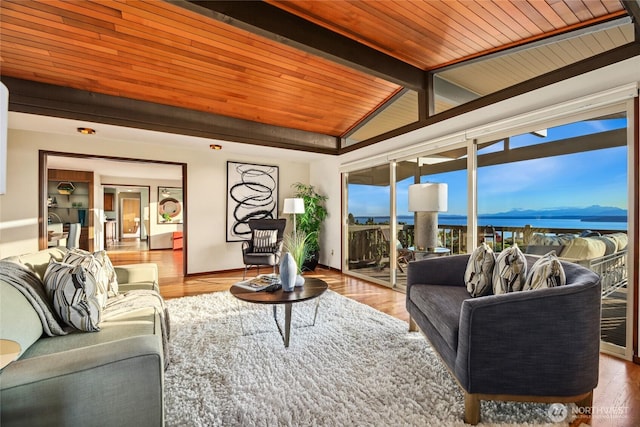 18354 Ridgefield Rd NW, Shoreline, WA 98177 - living area featuring wood ceiling, a water view, and wood finished floors