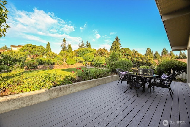 18354 Ridgefield Rd NW, Shoreline, WA 98177 - deck featuring outdoor dining area and a lawn