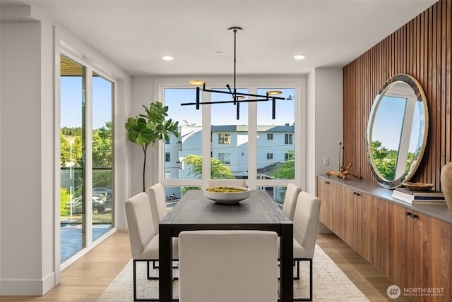 238 4th Ave Unit 300, Kirkland, WA 98033 - dining area featuring light wood-style floors, a chandelier, plenty of natural light, and recessed lighting