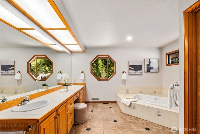 33202 2nd Pl SW, Federal Way, WA 98023 - bathroom featuring double vanity, a garden tub, and tile patterned flooring