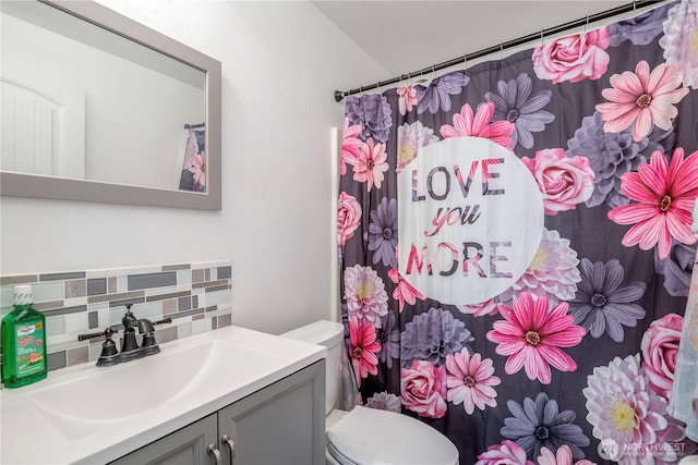 9211 Carys St SE, Yelm, WA 98597 - full bathroom featuring backsplash, vanity, and a shower with shower curtain