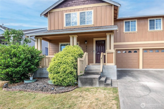 9211 Carys St SE, Yelm, WA 98597 - craftsman-style home featuring board and batten siding, concrete driveway, and a garage