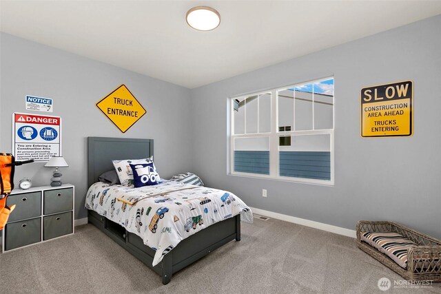 9802 5th Ln SW Unit 17, Seattle, WA 98106 - carpeted bedroom featuring baseboards