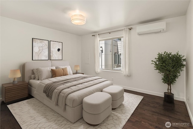 933 16th Avene, Seattle, WA 98122 - bedroom with a wall mounted AC and wood finished floors