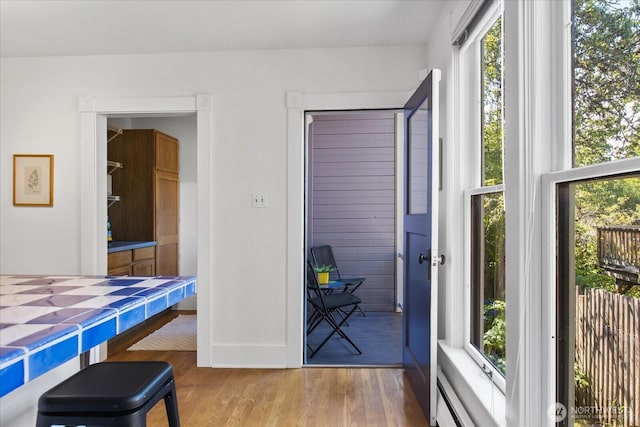 5825 4th Ave NW, Seattle, WA 98107 - dining area featuring wood finished floors and plenty of natural light