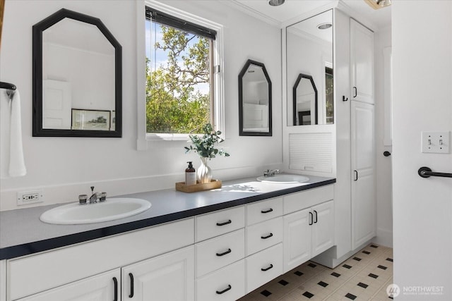 5825 4th Ave NW, Seattle, WA 98107 - bathroom featuring double vanity, ornamental molding, and tile patterned floors