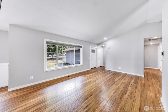 3919 Timothy Ct, Bellingham, WA 98226 - unfurnished living room with vaulted ceiling and wood-type flooring