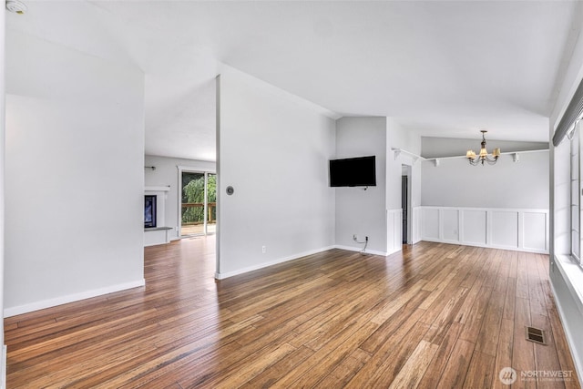 3919 Timothy Ct, Bellingham, WA 98226 - unfurnished living room with a chandelier and wood-type flooring