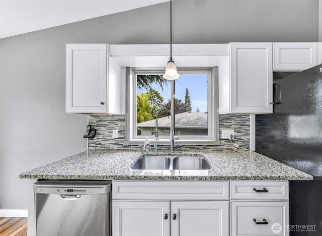 3919 Timothy Ct, Bellingham, WA 98226 - kitchen with stainless steel dishwasher, tasteful backsplash, and white cabinets