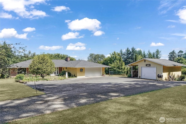 15638 94th Ave SW, Vashon, WA 98070 - ranch-style house with an outbuilding, gravel driveway, a garage, and a front lawn
