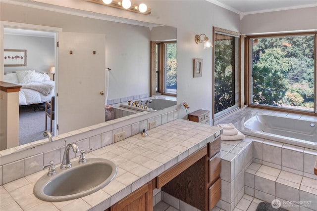 15638 94th Ave SW, Vashon, WA 98070 - ensuite bathroom featuring a garden tub, vanity, and ornamental molding
