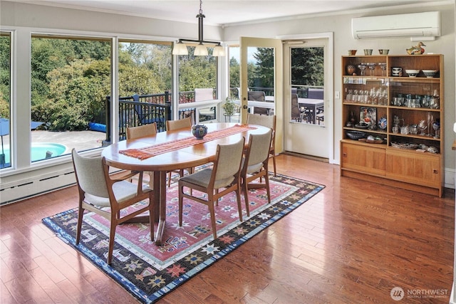 15638 94th Ave SW, Vashon, WA 98070 - dining space featuring a wall mounted air conditioner, crown molding, and wood finished floors