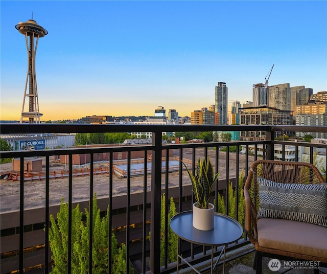 2911 2nd Ave Unit 1120, Seattle, WA 98121 - balcony at dusk with a skyline view