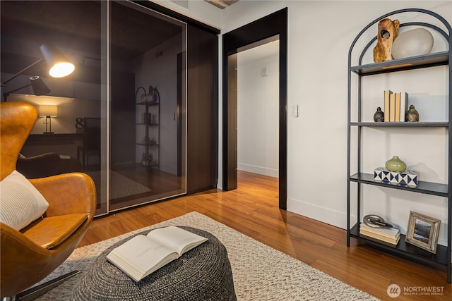 2911 2nd Ave Unit 1120, Seattle, WA 98121 - living area featuring wood finished floors