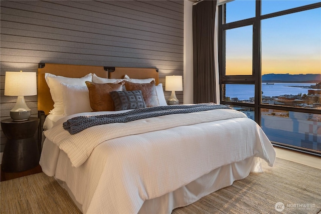2911 2nd Ave Unit 1120, Seattle, WA 98121 - bedroom with a water view and wood walls