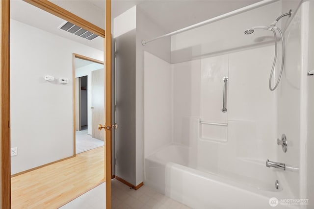1726 Ann St NE, Olympia, WA 98506 - bathroom featuring shower / bathtub combination and baseboards