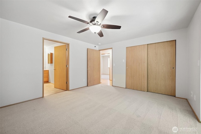 1726 Ann St NE, Olympia, WA 98506 - unfurnished bedroom featuring light carpet, a closet, ensuite bath, and a ceiling fan