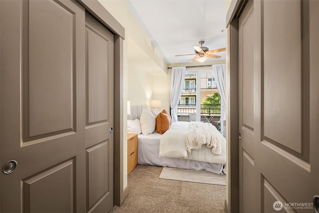 1840 25th Ave NE Unit 210, Issaquah, WA 98029 - bedroom featuring light colored carpet and a ceiling fan