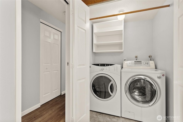 1100AVE NE Harrington Ave NE Unit 211, Renton, WA 98056 - laundry area with washing machine and dryer and wood finished floors