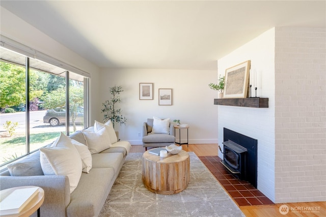 16047 Ashworth Ave N, Shoreline, WA 98133 - living area featuring dark wood-style flooring and baseboards