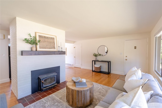 16047 Ashworth Ave N, Shoreline, WA 98133 - living area featuring wood finished floors and a baseboard radiator