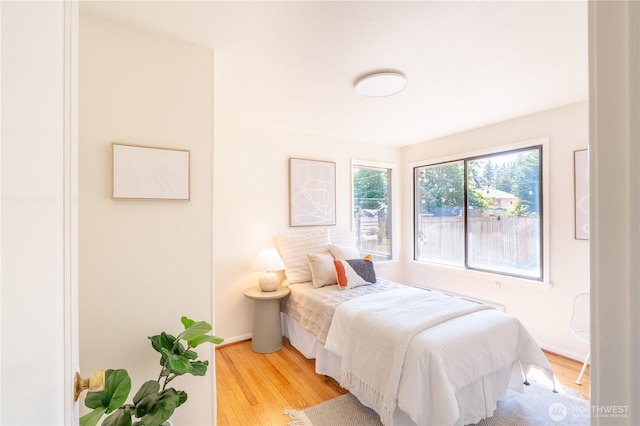 16047 Ashworth Ave N, Shoreline, WA 98133 - bedroom with light wood-style floors