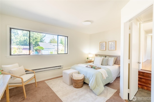 16047 Ashworth Ave N, Shoreline, WA 98133 - carpeted bedroom with baseboard heating and baseboards