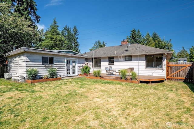 16047 Ashworth Ave N, Shoreline, WA 98133 - back of property with french doors, a deck, and a chimney