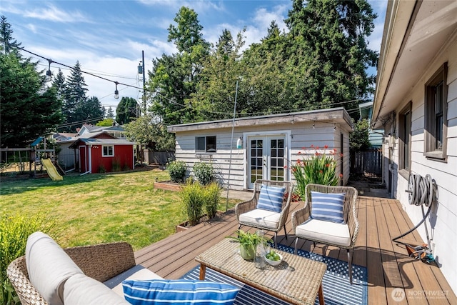 16047 Ashworth Ave N, Shoreline, WA 98133 - deck featuring a fenced backyard, an outdoor structure, french doors, and a playground