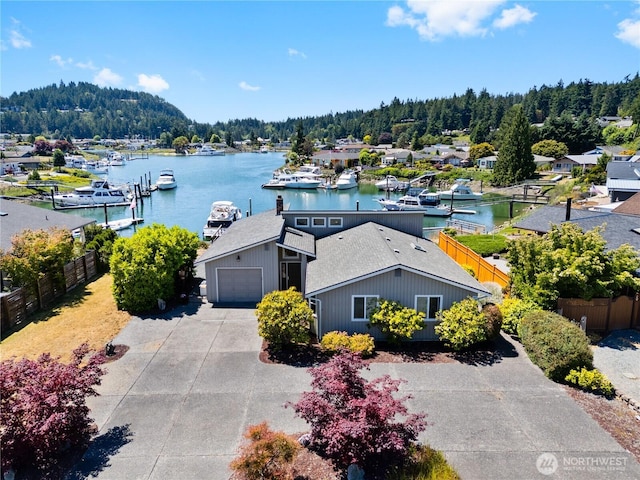 145 Lummi Dr, La Conner, WA 98257 - aerial view of property and surrounding area featuring a large body of water and a forest