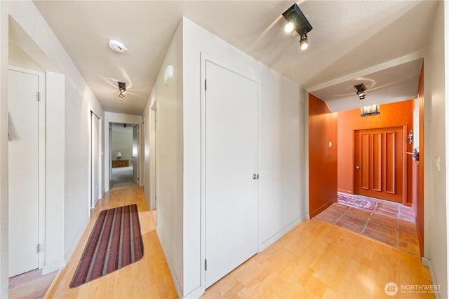 145 Lummi Dr, La Conner, WA 98257 - corridor featuring light wood-style floors and baseboards