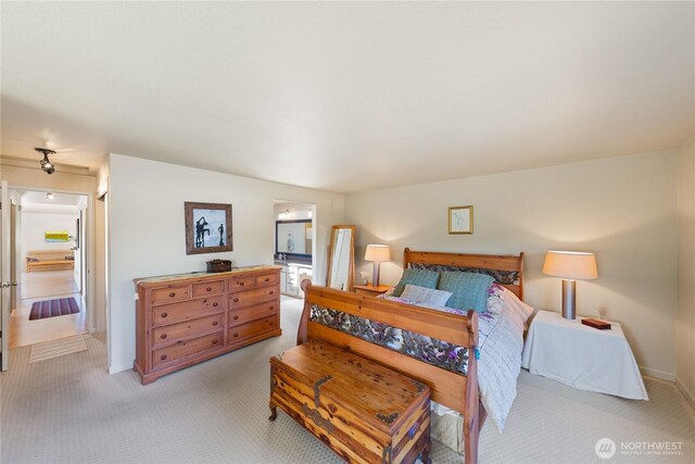 145 Lummi Dr, La Conner, WA 98257 - bedroom with light colored carpet and baseboards