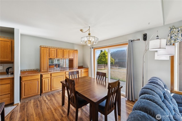 3519 G Ave, Anacortes, WA 98221 - dining space featuring a chandelier and light wood-style flooring