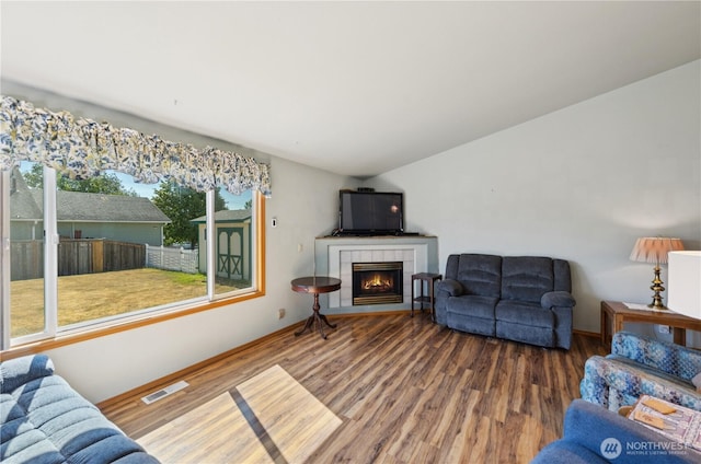 3519 G Ave, Anacortes, WA 98221 - living area with wood finished floors, a fireplace, and vaulted ceiling