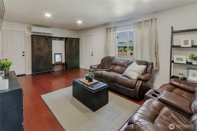 418 Jefferson St, Centralia, WA 98531 - living area featuring a wall mounted AC, dark wood-style floors, and recessed lighting