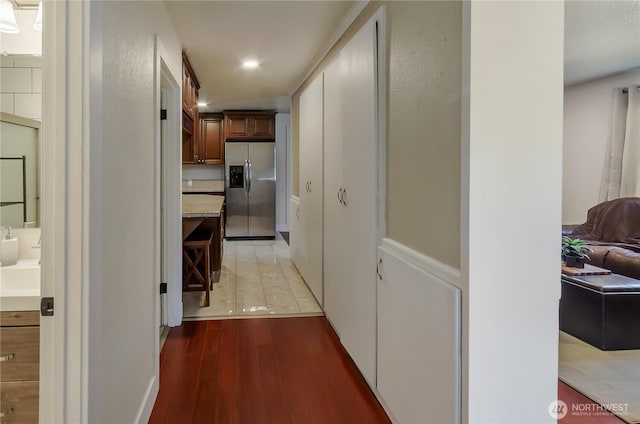418 Jefferson St, Centralia, WA 98531 - hallway featuring light wood-type flooring and a sink