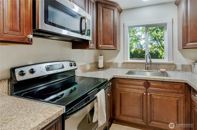 418 Jefferson St, Centralia, WA 98531 - kitchen featuring appliances with stainless steel finishes and light countertops