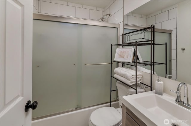 418 Jefferson St, Centralia, WA 98531 - bathroom featuring vanity and shower / bath combination with glass door