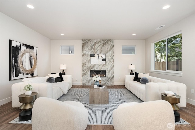 1515 243rd Pl SW Unit A, Bothell, WA 98012 - living area featuring wood finished floors, recessed lighting, and a premium fireplace