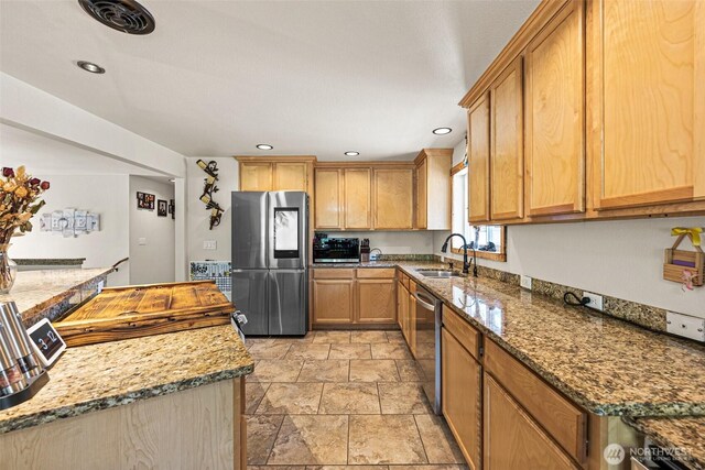 20311 Orting Kapowsin Hwy E, Graham, WA 98338 - kitchen with stainless steel appliances, light stone finish floors, light stone counters, and recessed lighting