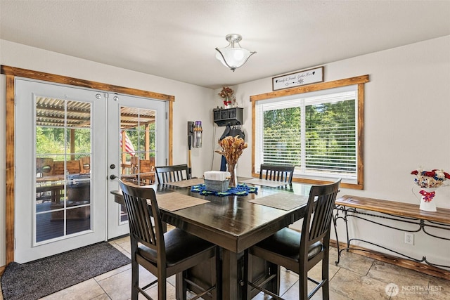 20311 Orting Kapowsin Hwy E, Graham, WA 98338 - dining room featuring french doors and healthy amount of natural light