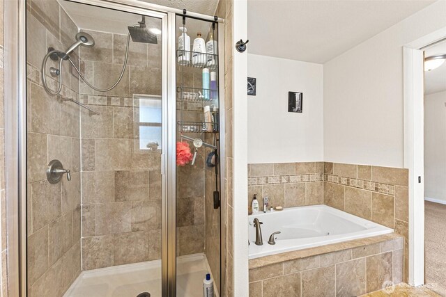 20311 Orting Kapowsin Hwy E, Graham, WA 98338 - bathroom featuring a stall shower and a bath